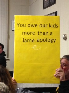 band sign at BOE meeting